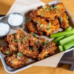 Bogo wings on national chicken wing day at twin peaks feature.jpg