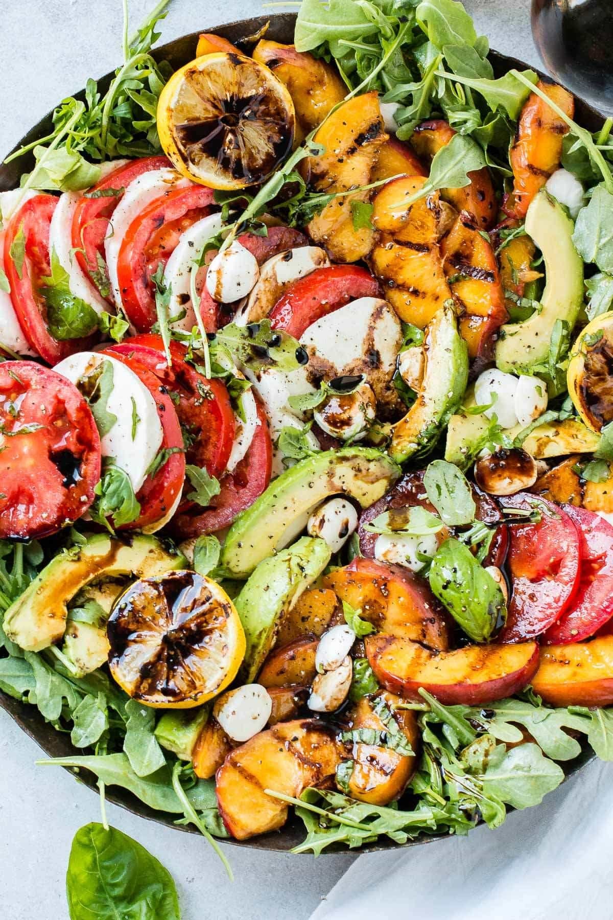 Grilled peach avocado caprese salad recipe ohsweetbasil.com 10.jpg