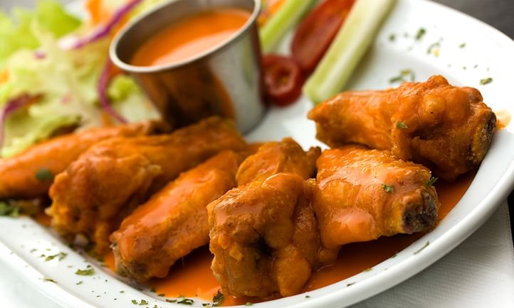 Hot wings hot deals celebrate national chicken wing day with a saucy kick feature.jpg