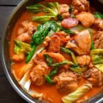 Pocherong manok in a wok.jpg