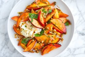 1755628691 peach burrata salad recipe 2.jpg