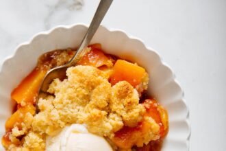 Peach cobbler with ice cream.jpg