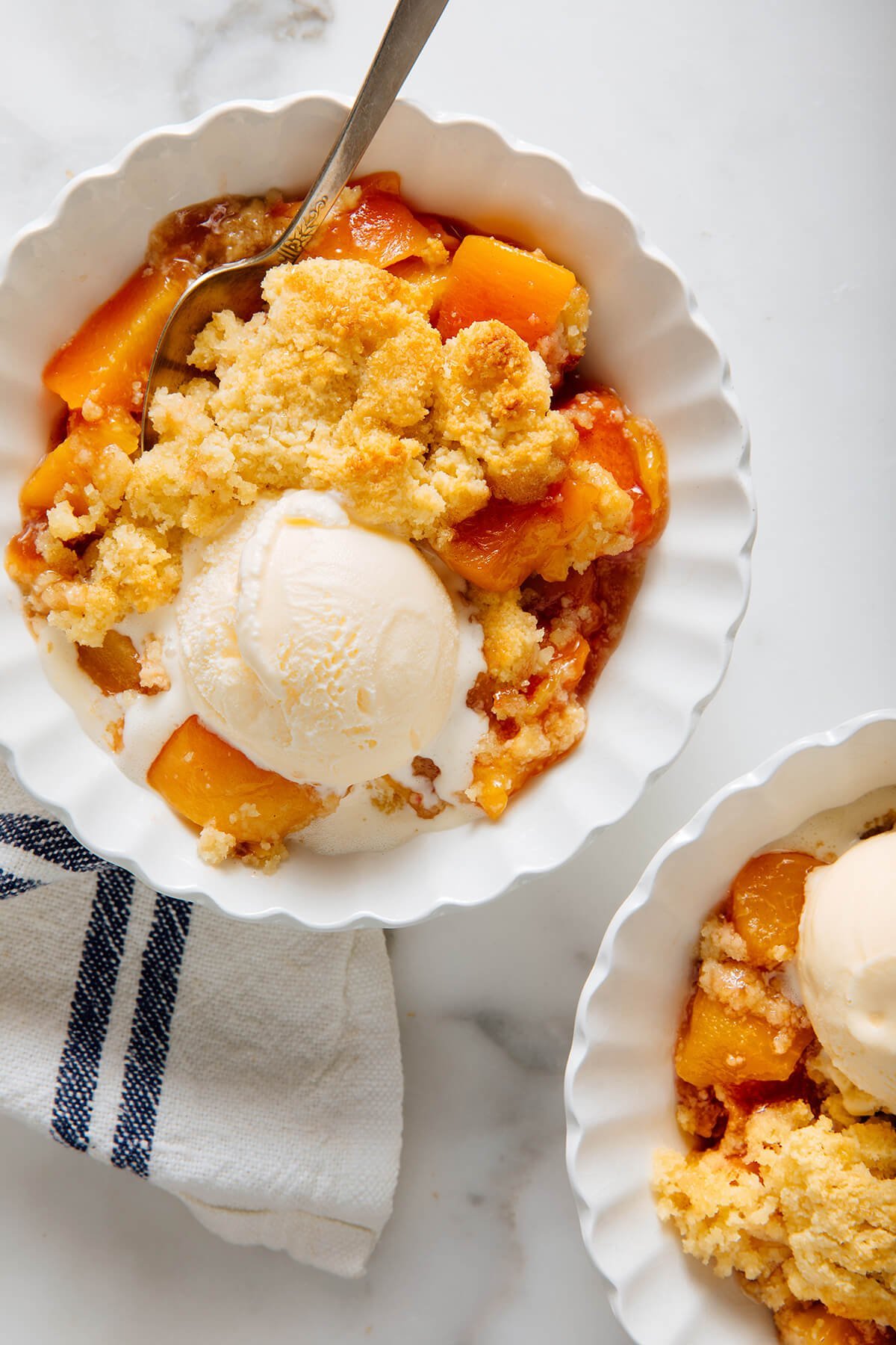 Peach cobbler with ice cream.jpg