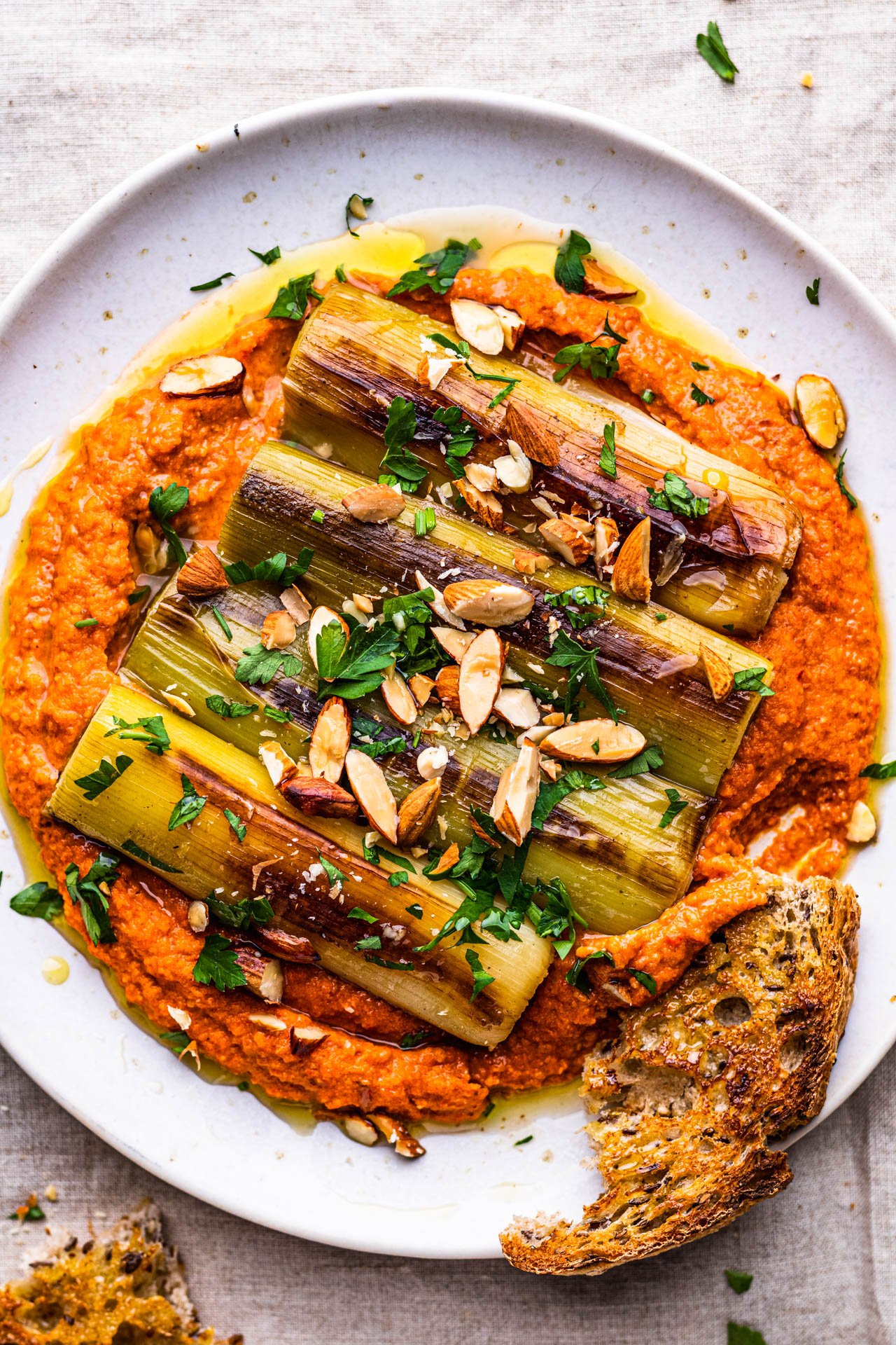 Romesco sauce braised leeks bread torn.jpg